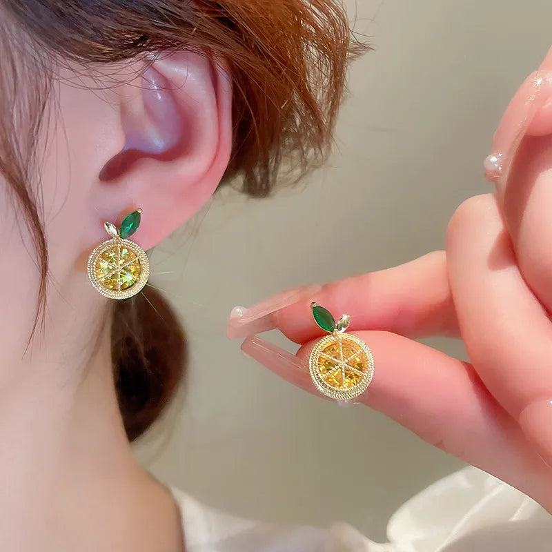 Cute Lemon Cubic Zirconia Stud Earrings Lemon-Shaped Jewelry for Women Fun and Stylish Stud Earrings Women's Cubic Zirconia Earrings Playful Lemon Earrings Sparkling Stud Earrings High-Quality Lemon Earrings Unique Fruit Jewelry Women's Fashion Earrings Hypoallergenic Stud Earrings Casual and Formal Earrings Trendy Lemon Jewelry Charming Stud Earrings Women's Fun Accessories Elegant Cubic Zirconia Earrings